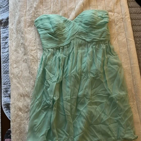green emerald velvet dress Donna Morgan Sleeveless Pleated Midi Dress  Trendy Twist Boutique